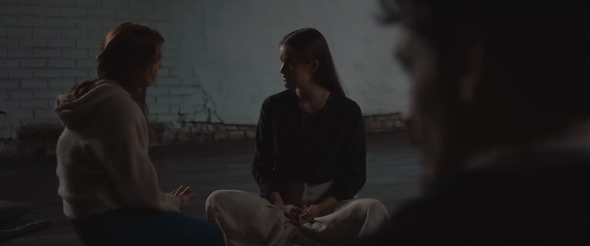 Nathalie, Ebba and Karl during a group meditation